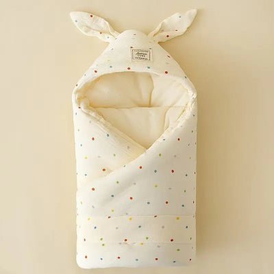 nid d'ange bebe motifs petits points couleurs
