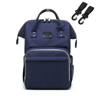 Sac à dos à langer bleu crochets poussettes