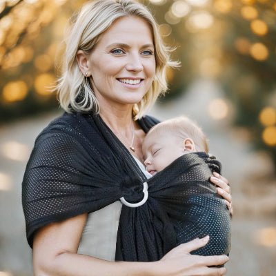sling bebe maman nouveau-né dort lumières