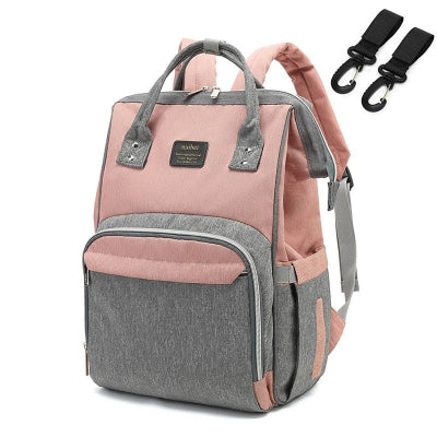 Sac à dos à langer rose gris accroches poussette