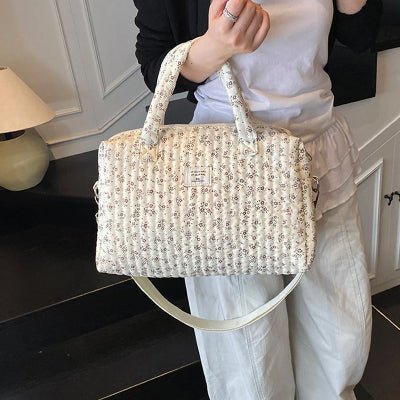sac a langer voyage bras femme 